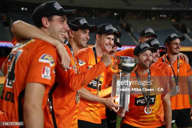 The Perth Scorchers pose with the BBL trophy during the Men's Big Bash League match between the Perth Scorchers and the Sydney Sixers at Marvel...