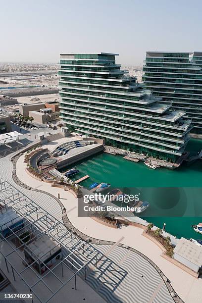 Motorboats sit at berths in the Al Bandar marina development in Abu Dhabi, United Arab Emirates, on Tuesday, Jan. 10, 2012. Abu Dhabi, the oil-rich...