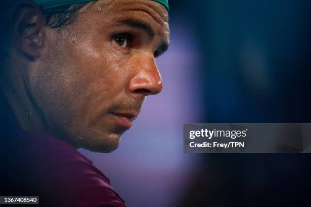 Rafa Nadal of Spain between games during his match against Matteo Berrettini of Italy during day 12 of the 2022 Australian Open at Melbourne Park on...