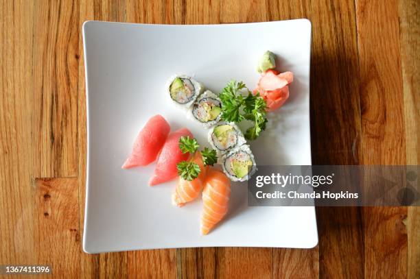 plate of sushi - sushi plate stock pictures, royalty-free photos & images