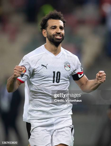 Mohamed Salah of Egypt celebrates after scoring the winning penalty and winning the Africa Cup of Nations 2021 round of 16 football match between...