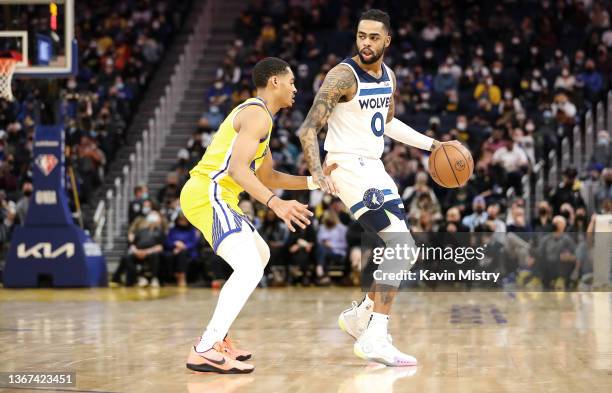 U2019Angelo Russell of the Minnesota Timberwolves dribbles up the court against Jordan Poole of the Golden State Warriors at Chase Center on January...