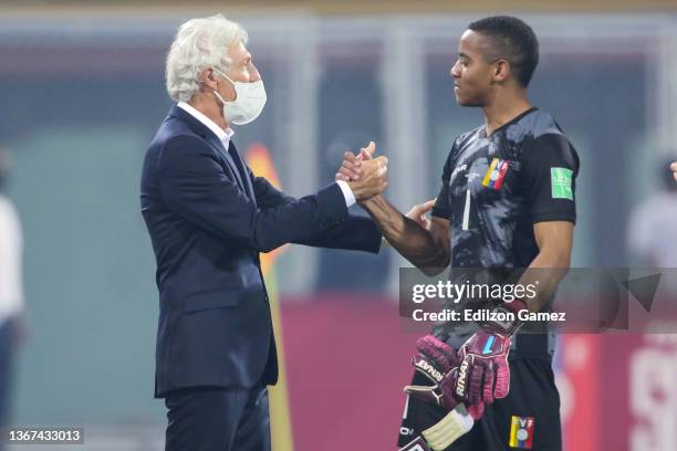 Jose Pekerman coach of Venezuela shakes hands with Wuilker Fariñez of Venezuela after a match between Venezuela and Bolivia as part of FIFA World Cup...