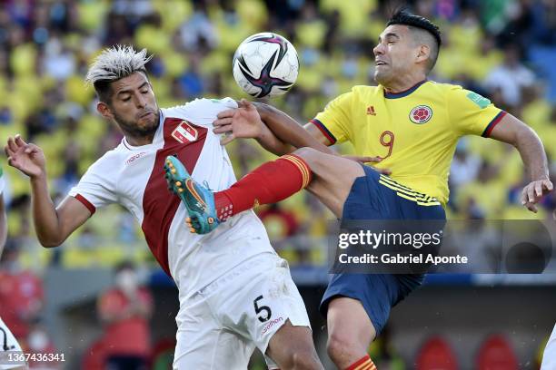 Carlos Zambrano of Peru fights for the ball with Radamel Falcao of Colombia during a match between Colombia and Peru as part of FIFA World Cup Qatar...