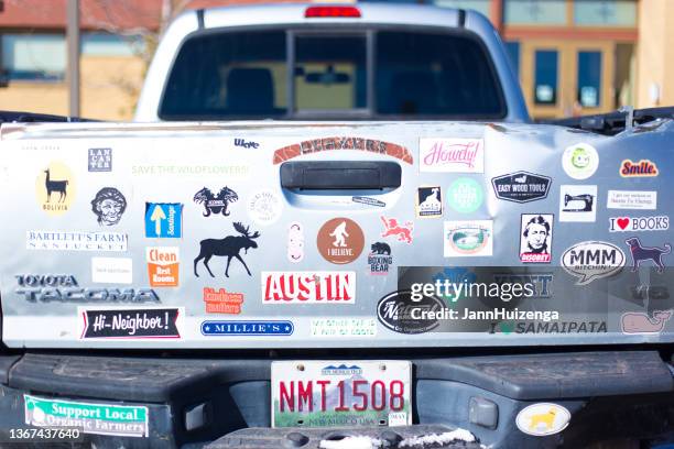 santa fe, nm: bumper stickers on parked pickup truck - bumper sticker stock pictures, royalty-free photos & images