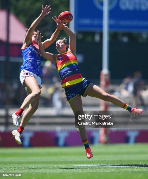 Gabrielle Colvin of the Demons competes with Caitlin Gould of the Adelaide Crows during the round four AFLW match between the Adelaide Crows and the...