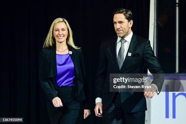 Gabriella and Joel Lundqvist take part in Henrik Lundqvist's jersey retirement ceremony prior to a game between the New York Rangers and Minnesota...