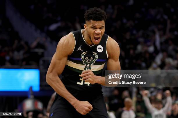 Giannis Antetokounmpo of the Milwaukee Bucks reacts to a three point shot against the New York Knicks during the fourth quarter at Fiserv Forum on...