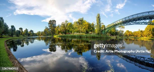 panoramic view of the adelaide university footbridge and river torrens (karrawirra parri), adelaide, south australia - footbridge stock pictures, royalty-free photos & images