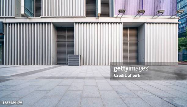 facade of a building in business district - white brick stock pictures, royalty-free photos & images
