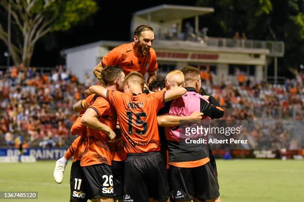 Rahmat Akbari of the Roar celebrates with team mates after scoring a goal during the round 12 A-League Men's match between Brisbane Roar and Western...