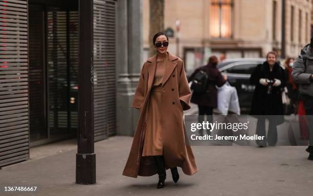 Chriselle Lim is seen outside Elie Saab during Paris Fashion Week Haute Couture Spring/Summer 2022 on January 26, 2022 in Paris, France.