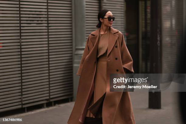 Chriselle Lim is seen outside Elie Saab during Paris Fashion Week Haute Couture Spring/Summer 2022 on January 26, 2022 in Paris, France.