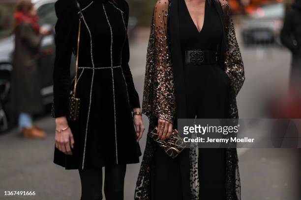Valery Kaufman and Ophelie Guillermand are seen outside Elie Saab during Paris Fashion Week Haute Couture Spring/Summer 2022 on January 26, 2022 in...