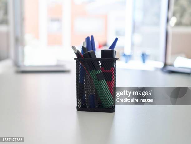 close-up of pencils and markers in desk organizer on table - desk organizer stock pictures, royalty-free photos & images