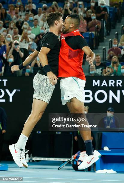 Nick Kyrgios of Australia and Thanasi Kokkinakis of Australia celebrate match point in their Men's Doubles Final match against Matthew Ebden of...