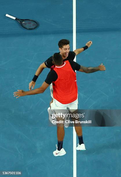 Nick Kyrgios of Australia and Thanasi Kokkinakis of Australia celebrate match point in their Men's Doubles Final match against Matthew Ebden of...