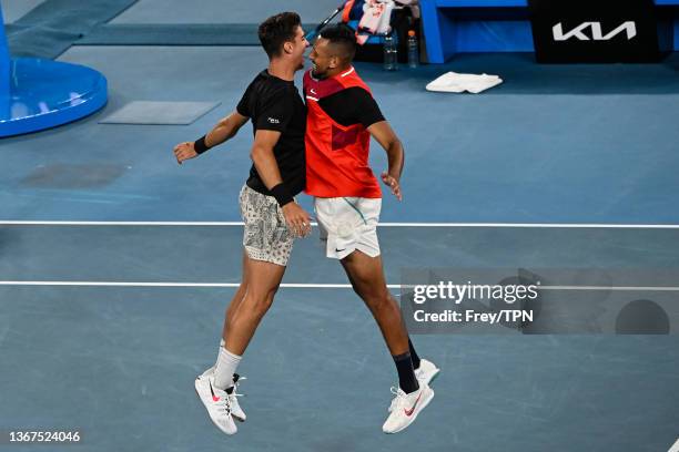 Nick Kyrgios of Australia and Thanasi Kokkinakis of Australia celebrate beating Max Purcell of Australia and Mathew Ebden of Australia in the final...