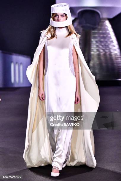 Model walks the runway during the Pierre Cardin 3022 fashion show tribute to Pierre Cardin presenting unprecedented outfits at Musee de l'Air et de...