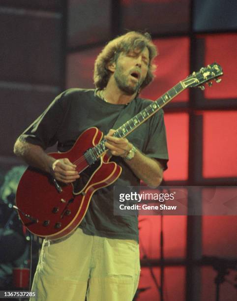 British Rock and Blues musician Eric Clapton plays guitar as he performs onstage at Madison Square Garden, New York, New York, October 8, 1994.