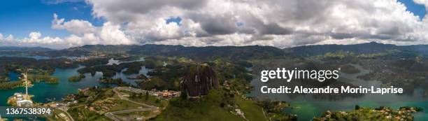 view of the stone (the guatape peñol) from the countryside in antioquia, colombia - colombia jungle stock pictures, royalty-free photos & images