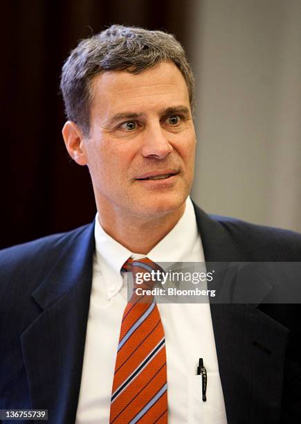 Alan Krueger, chairman of U.S. President Barack Obama's Council of Economic Advisers, waits from the start of a roundtable meeting titled "Insourcing...