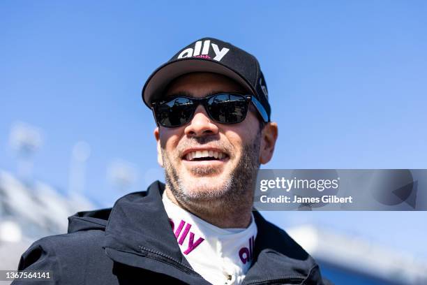 Jimmie Johnson driver of the Ally Cadillac Racing Cadillac DPi, looks on before the start of the Rolex 24 at Daytona International Speedway on...