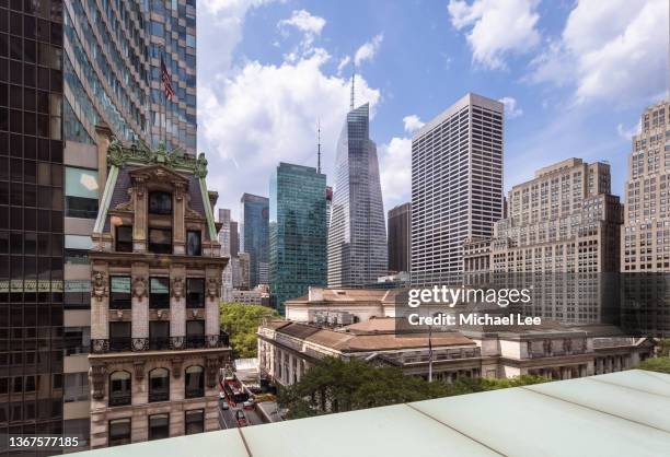 high angle view of new york public library and midtown manhattan office towers - new york public library exterior stock pictures, royalty-free photos & images