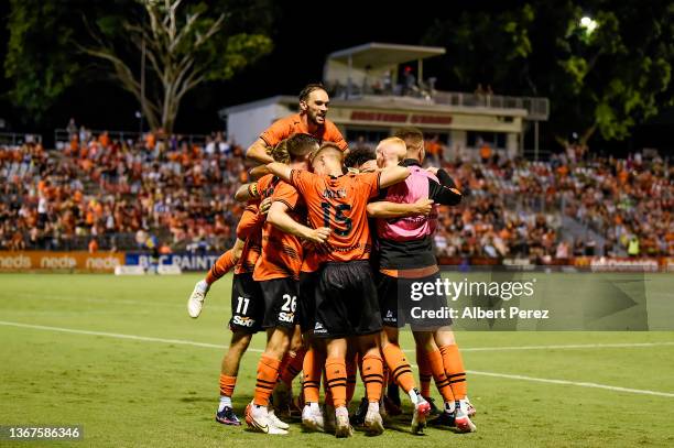 Rahmat Akbari of the Roar celebrates with team mates after scoring a goal during the round 12 A-League Men's match between Brisbane Roar and Western...