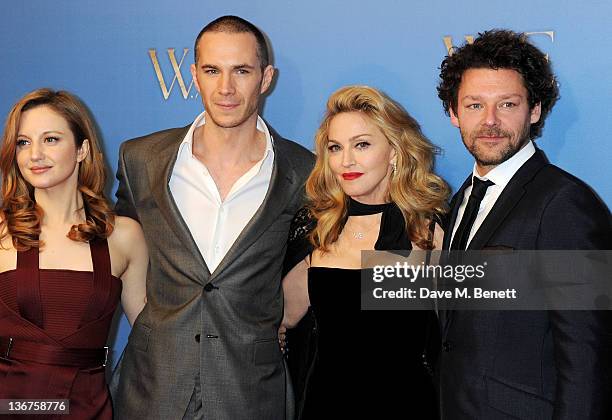 Actors Andrea Riseborough, James D'Arcy, writer/director Madonna, and actor Richard Coyle attend the UK premiere of 'W.E.' at Kensington Odeon on...