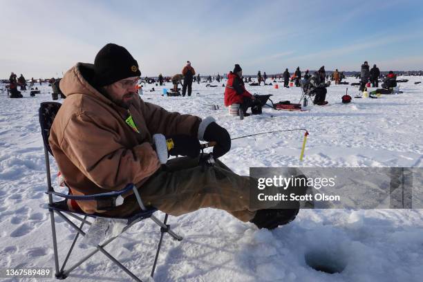 Fishermen compete in the Brainerd Jaycees Ice Fishing Extravaganza on January 29, 2022 in Brainerd, Minnesota. About 10,000 anglers were expected to...