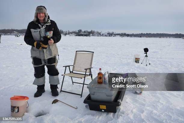 Fishermen prepare for the start of the Brainerd Jaycees Ice Fishing Extravaganza on January 29, 2022 in Brainerd, Minnesota. About 10,000 anglers...