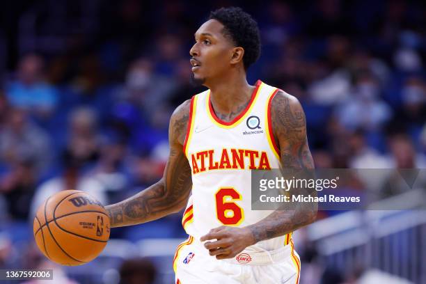 Lou Williams of the Atlanta Hawks in action against the Orlando Magic during the first half at Amway Center on December 15, 2021 in Orlando, Florida....