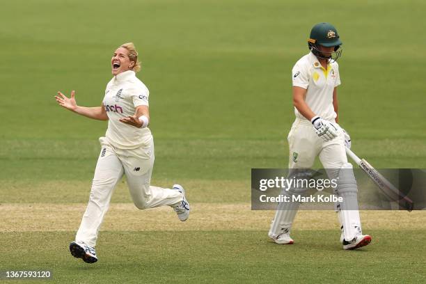 Katherine Brunt of England celebrates taking the wicket of Meg Lanning of Australia during day four of the Women's Test match in the Ashes series...