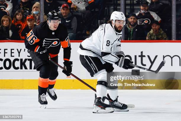 Isaac Ratcliffe of the Philadelphia Flyers and Drew Doughty of the Los Angeles Kings look on at Wells Fargo Center on January 29, 2022 in...