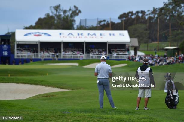 Luke List stands on the 18th hole during the final round of The Farmers Insurance Open on the South Course at Torrey Pines Golf Course on January 29,...