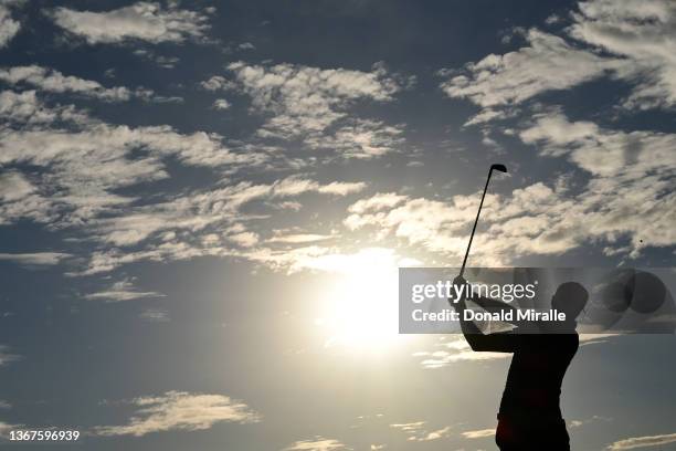 Will Zalatoris hits his tee shot on the 16th hole during the final round of The Farmers Insurance Open on the South Course at Torrey Pines Golf...