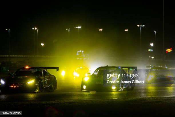 The Wright Motorsports Porsche 911 GT3R of Ryan Hardwick, Zacharie Robichon, Jan Heylen, and Richard Lietz drives during the Rolex 24 at Daytona...