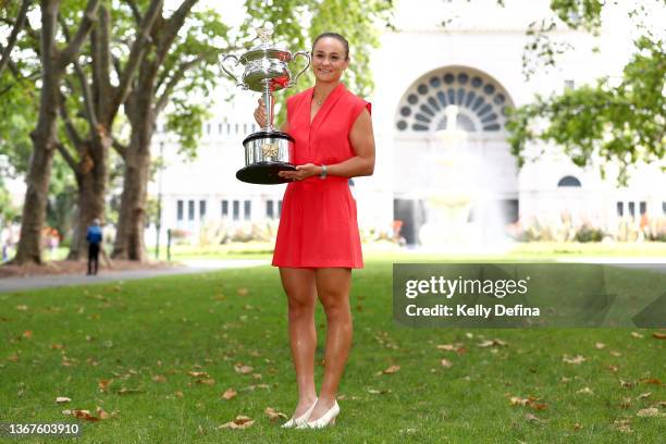 Ashleigh Barty of Australia poses with the Daphne Akhurst Memorial Cup after winning last nights 2022 Australian Open Women's Singles Final, at Royal...