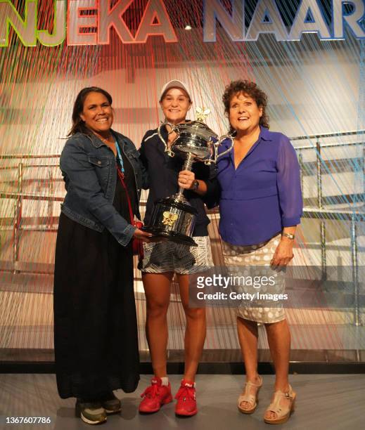 In this handout photo provided by Tennis Australia, Ashleigh Barty of Australia poses with Evonne Goolagong Cawley, and Cathy Freeman after she won...