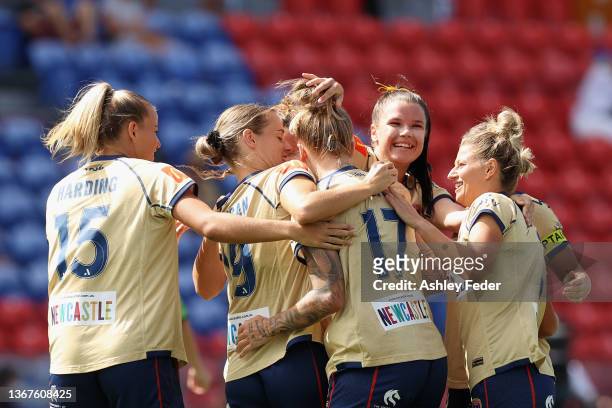 Marie Dolvic Markussen of the Jets celebrates her goal with team mates during the A-League Women's round nine match between Newcastle Jets and...