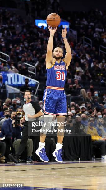 Stephen Curry of the Golden State Warriors takes a jump shot in the second half against the Brooklyn Nets at Chase Center on January 29, 2022 in San...