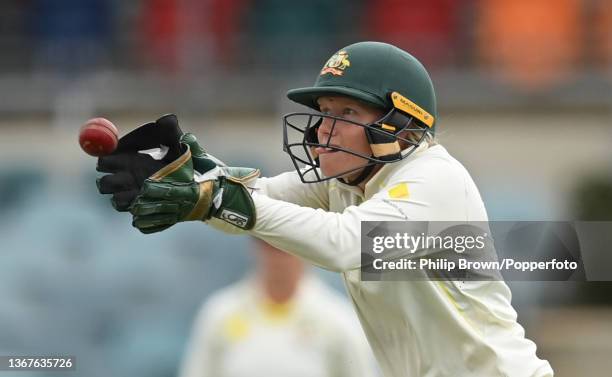 Alyssa Healy of Australia catches the ball during day four of the Women's Test match in the Ashes series between Australia and England at Manuka Oval...