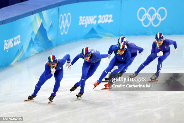 Team Italy skate during a men's short track speed skating practice session ahead of the Beijing 2022 Winter Olympic Games at Capital Indoor Stadium...