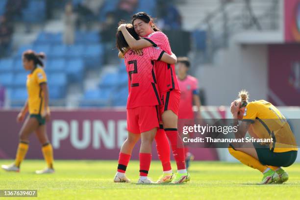 Shim Seo-yeon and Choo Hyojoo of South Korea celebrate their 1-0 victory while Alanna Kennedy of Australia shows dejection after the AFC Women's...