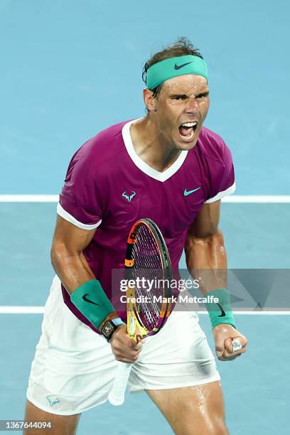 Rafael Nadal of Spain celebrates after winning a point in his Men's Singles Final match against Daniil Medvedev of Russia during day 14 of the 2022...
