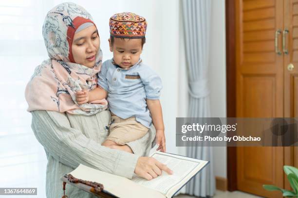 muslim mom and son - namaz stock pictures, royalty-free photos & images