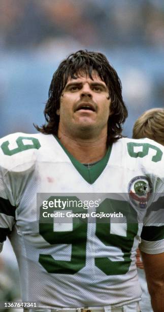 Defensive lineman Mark Gastineau of the New York Jets looks looks on from the sideline during a game against the Cleveland Browns at Cleveland...