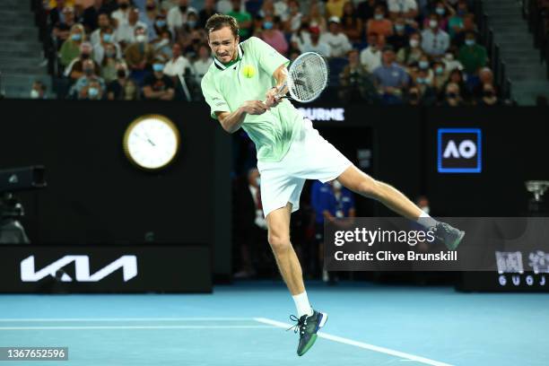 Daniil Medvedev of Russia plays a backhand in his Men's Singles Final match against Rafael Nadal of Spain during day 14 of the 2022 Australian Open...