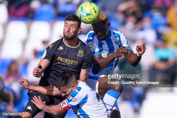 Kenneth Omeruo of CD Leganes battle for the ball with Borja Valle AD Alcorcon during the LaLiga Smartbank match between CD Leganes and AD Alcorcon at...